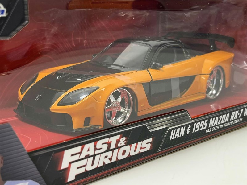 a toy car in a box