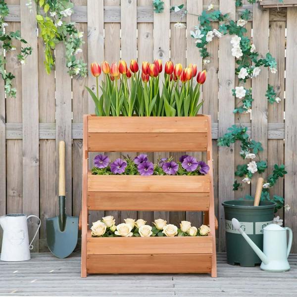 Brown 3-tier wooden raised planter box with stacked compartments and flower plants