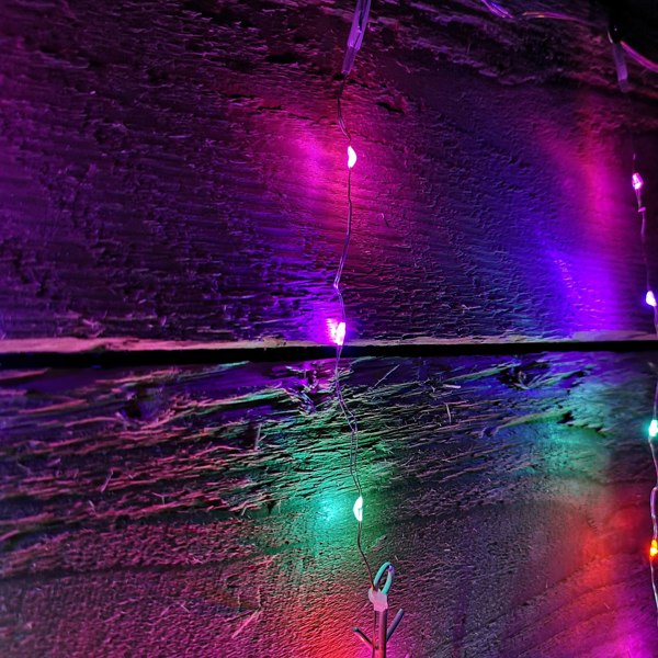 Samuel Alexander 1.2m Christmas Static Snowflake LED Silver Pin Wire V Curtain Lights in Rainbow