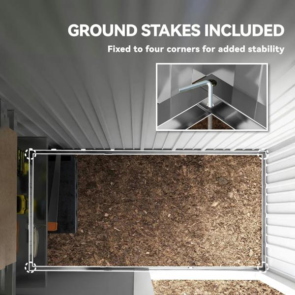 Metal shed base frame with included ground stakes for stability, view from inside