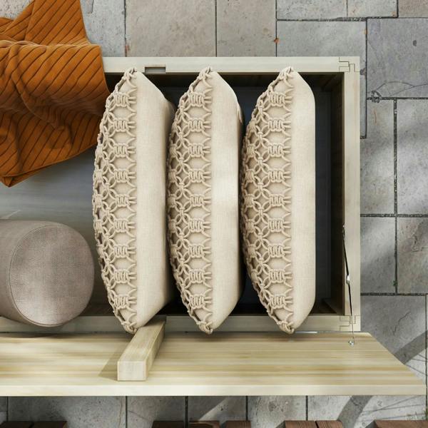 Open natural wooden storage box interior with three padded cushions