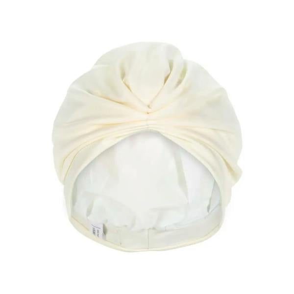 Cream-colored Fashy Turban fabric swim cap with soft cotton texture and adjustable strap