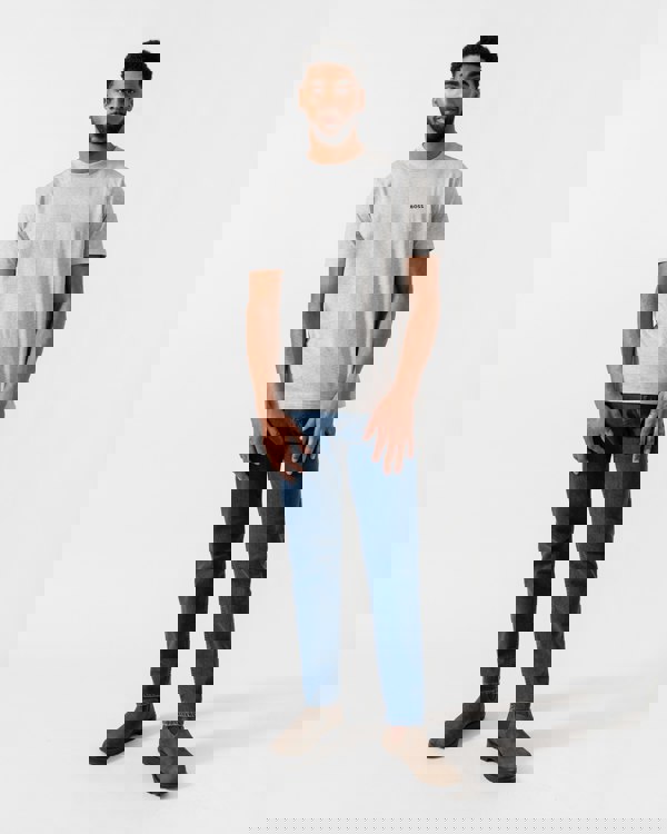 Model wearing BOSS Green Mens Tee Stretch Cotton T-Shirt with Contrast Logo in Silver 043 - Full Length