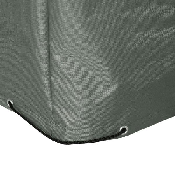 Dark gray sofa cover corner with stitched hem and metal grommet eyelets for ties.