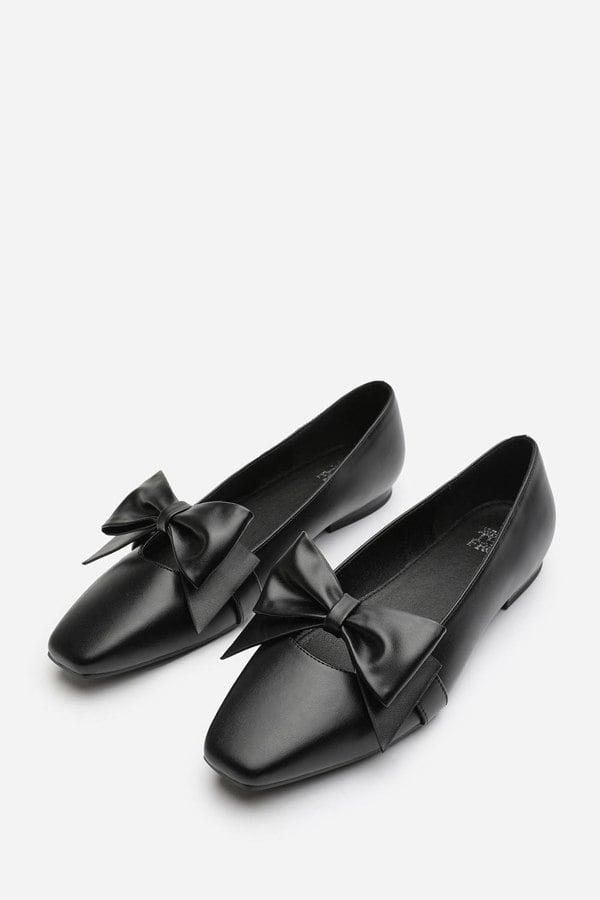 Where's That From Jessica Pointed Toe Ballet Flats With Bow Detail In Black Faux Leather