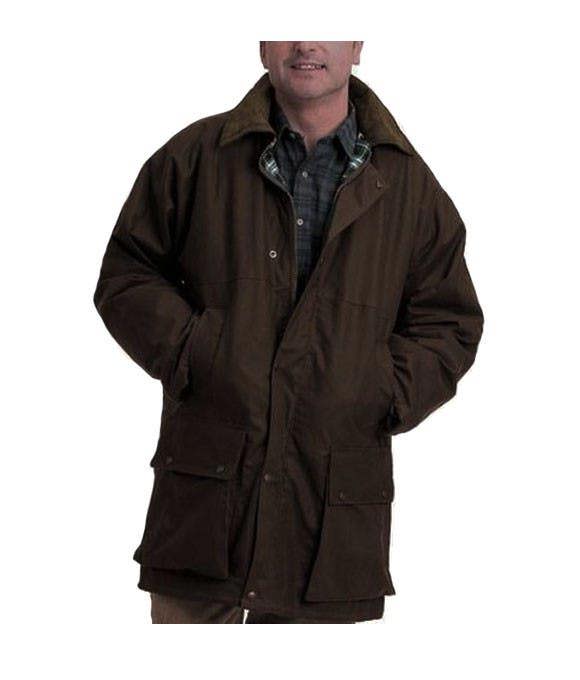 Man wearing Game padded waxed jacket with tartan lining and handwarmer pockets