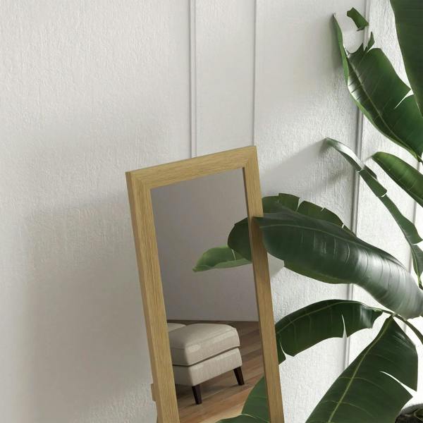 Full-length wall mirror with light natural wood frame, mounted on wall