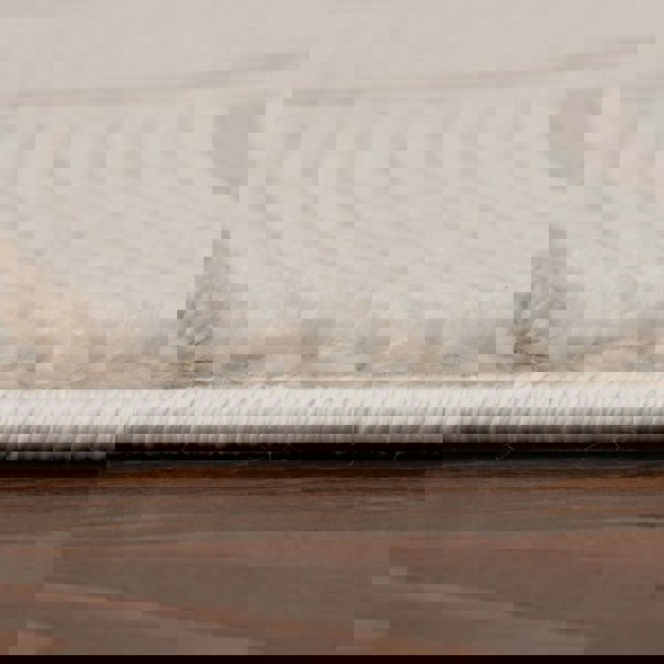 Living Room rug, beige-cream colours, geometric, practicality in mind, the rug is anti-allergic.