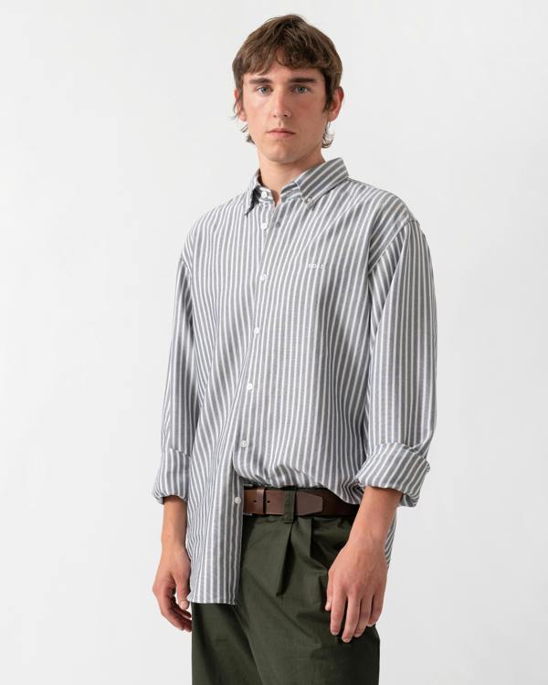 model wearing a BOSS Orange Ricoplus Mens Long Sleeve Oxford Shirt in Dark Blue 404