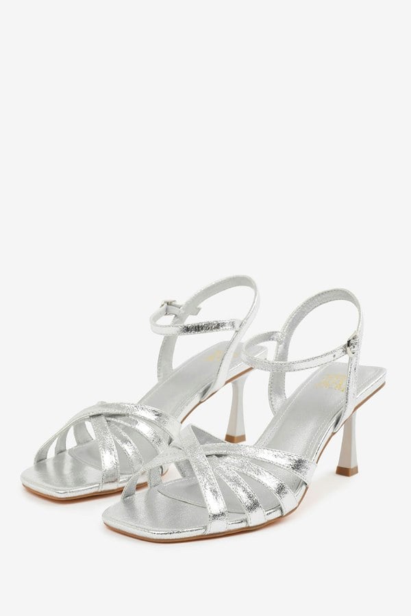 Where's That From Torigh Wide Fit Cross Over Multi Strap Adjustable Buckle Heel in Silver Crinkle Pu