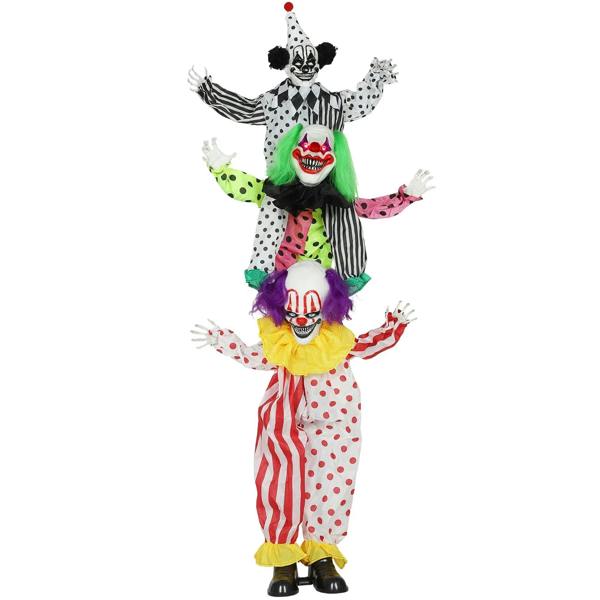 Multicolored clown decoration figure in polka-dot and striped outfit, red light-up eyes