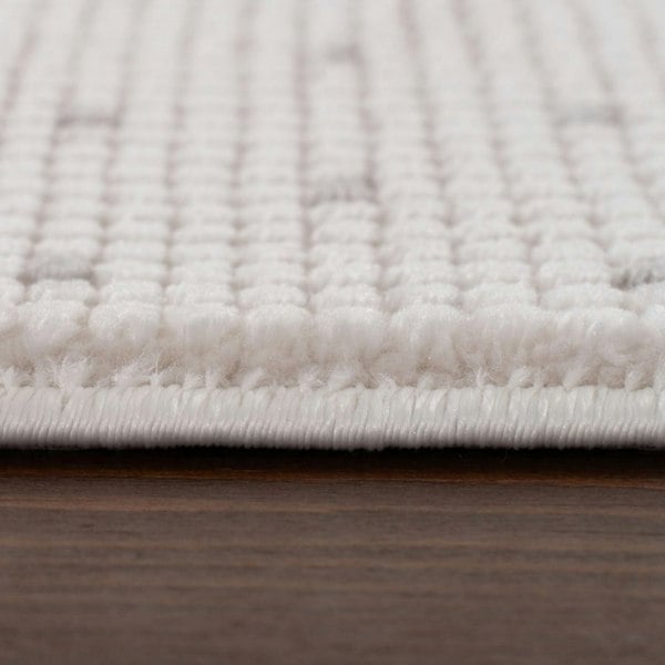 Living Room rug, grey-cream colours, dots, practicality in mind, the rug is anti-allergic.