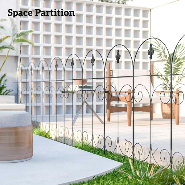 Black metal outdoor space partition fence with arched tops and curled scrolls