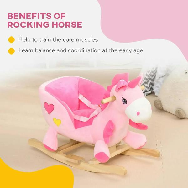 Pink unicorn rocking horse ride-on with wooden base and heart-decorated seat