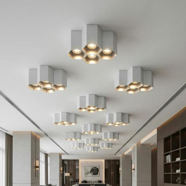 Silver modern flush mount ceiling light in a hotel bar