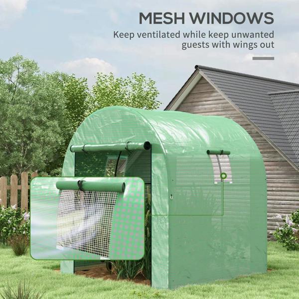 Green polytunnel greenhouse with mesh window sections and black metal bar frame