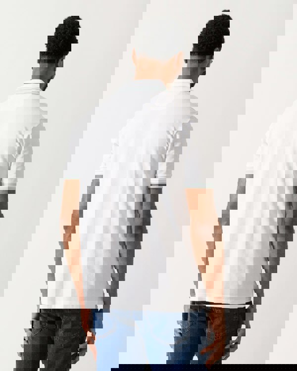 back shot of a Model wearing a BOSS Green Paddy Mens Cotton-Piqué Polo Shirt with Contrast Logo in Open White