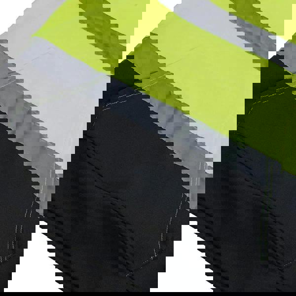 Scruffs High Visibility Mens Hi-Viz Work Pull Over Hoodie, close-up of the black hoodie with high visibility yellow upper section and reflective grey strips for safety.