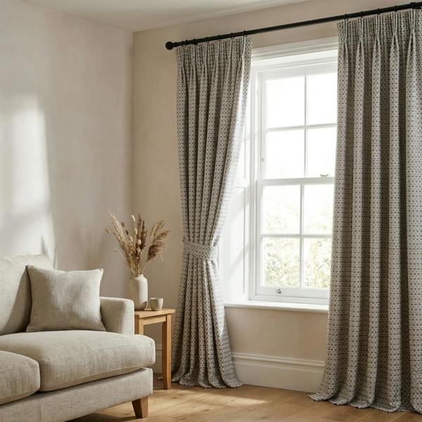 Limoges* made-to-measure curtains in Grey, styled in a living room