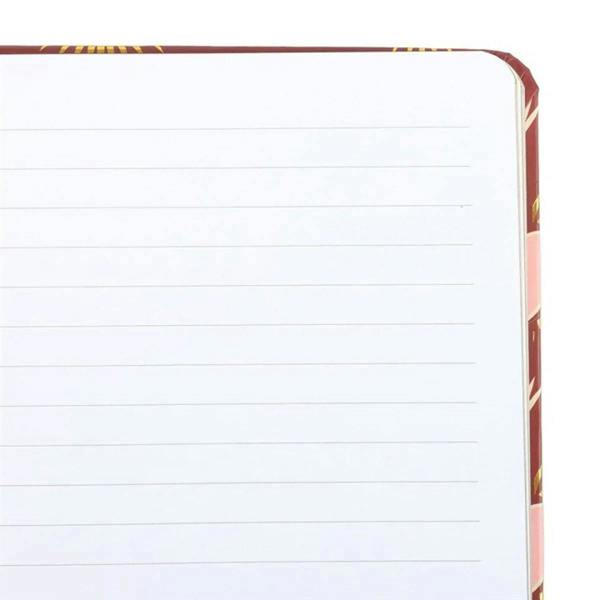 Sacred Heart print A5 notebook open to lined pages with maroon patterned cover edge