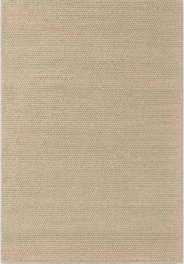 Beige textured rug with a subtle pattern