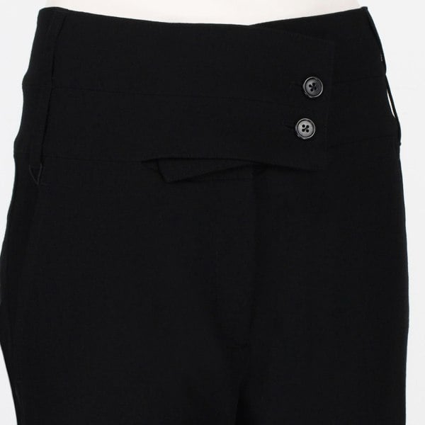 Ann Demeulermeester finely woven black wool trousers
High waisted trousers with crossover tab to waistline
Button fastening with gently tapered leg