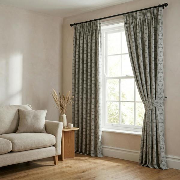 Axel made-to-measure curtains in Fern, styled in a living room