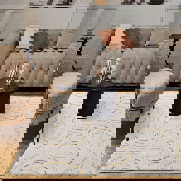 Living Room rug, gold-cream colours, geometric, practicality in mind, the rug is anti-allergic.