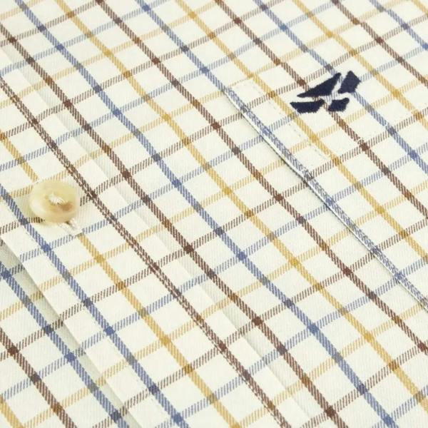 Close-up of Hoggs of Fife Inverness Tattersall shirt fabric showing crisp check pattern, soft cotton texture and button stitching