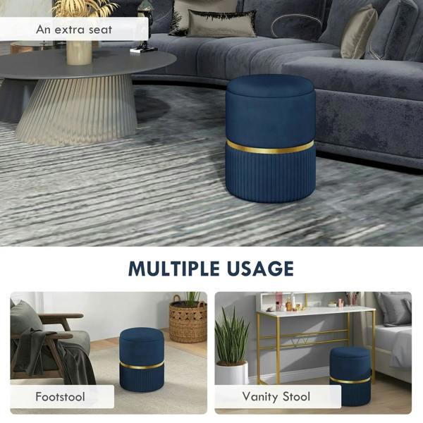 Dark blue storage ottoman with gold band and fluted sides used as extra seat