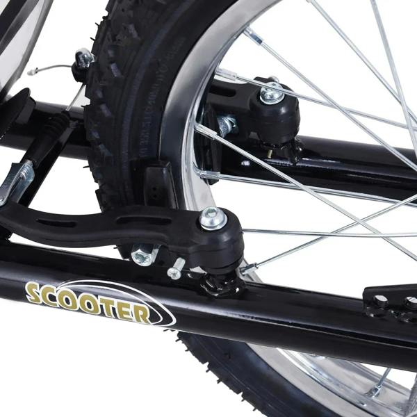 Front wheel close-up of black kids stunt scooter with tire tread and chrome spokes