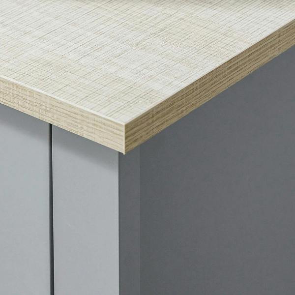 Light wood-look countertop edge on grey cabinet frame for under-sink storage