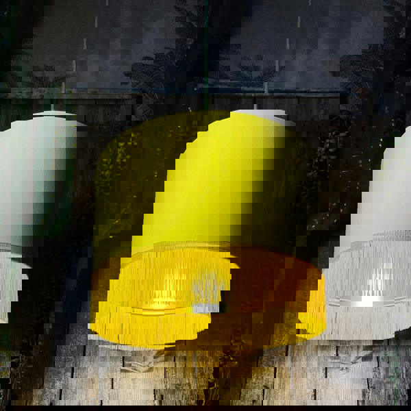 Love Frankie banana cotton lampshade gold lining and fringing light on