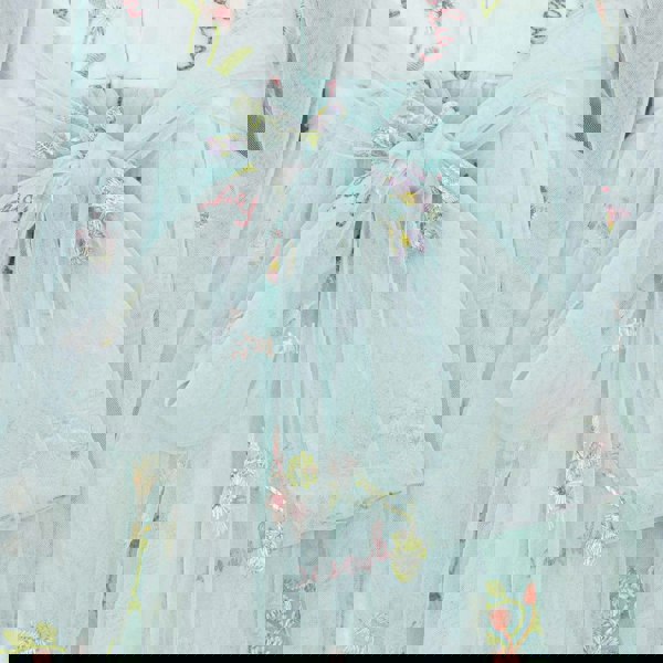 Rear bow on embroidered dress