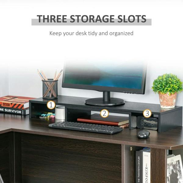 Black monitor stand riser with three storage slots for desk organization