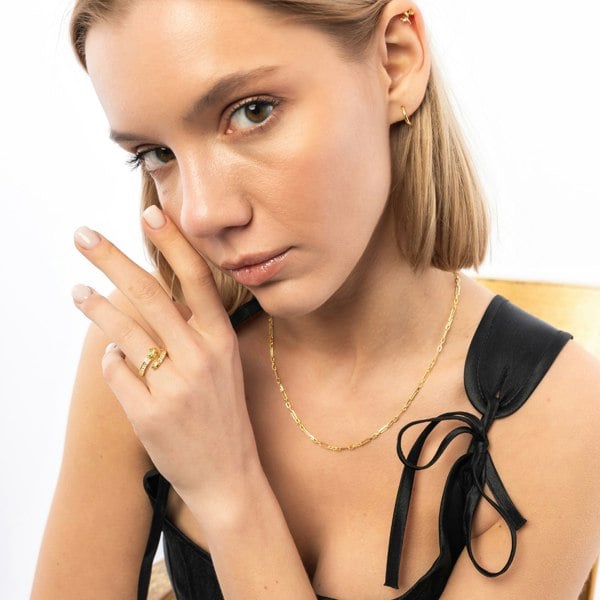 Spero London Baguette Snake Ring With Green Eyes in Sterling Silver