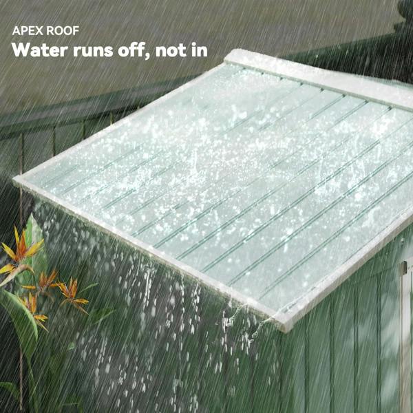 Light green metal garden shed with apex roof designed to shed water