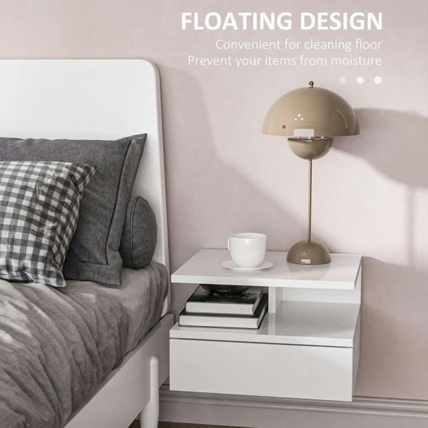 White floating bedside table with tabletop, open shelves, and drawer under lamp
