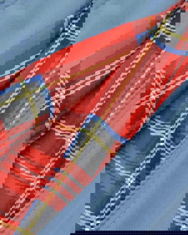 Lambretta Mens ShowerProof Classic Harrington MOD Scooter Jacket Coat, close-up image showing the plaid inner lining and light blue exterior fabric.