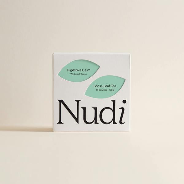 Nuditea Digestive Calm luxury tea box featuring two mint green leaf labels on a white background