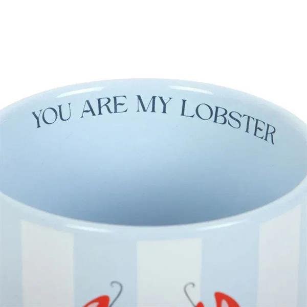 Light blue mug rim with black text 'YOU ARE MY LOBSTER' and partial lobster artwork
