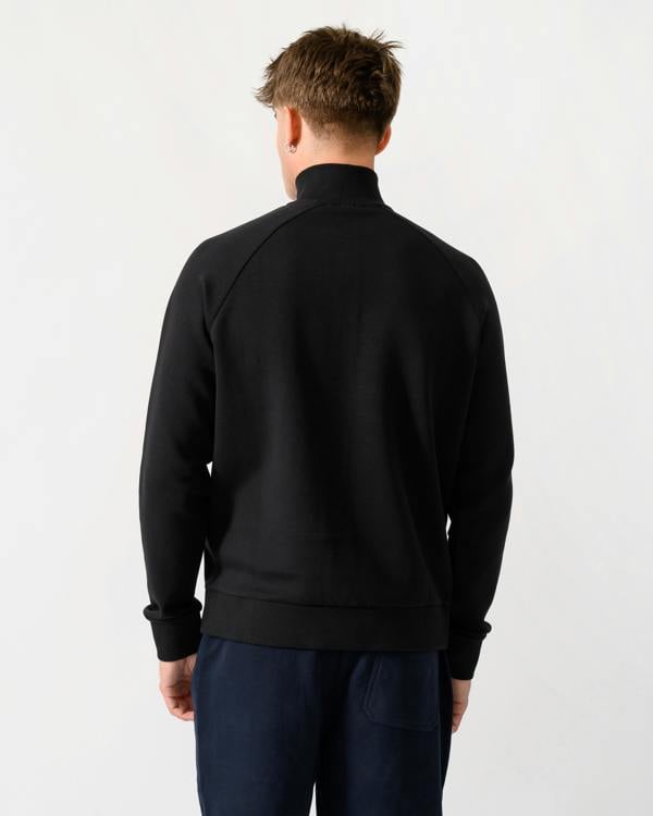 back shot of a model wearing a BOSS Green Sweat Mens 1/4 Zip Sweatshirt in Black 001