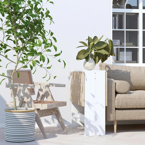 Folding drop-leaf dining table with oak top and white body, leaf down position.