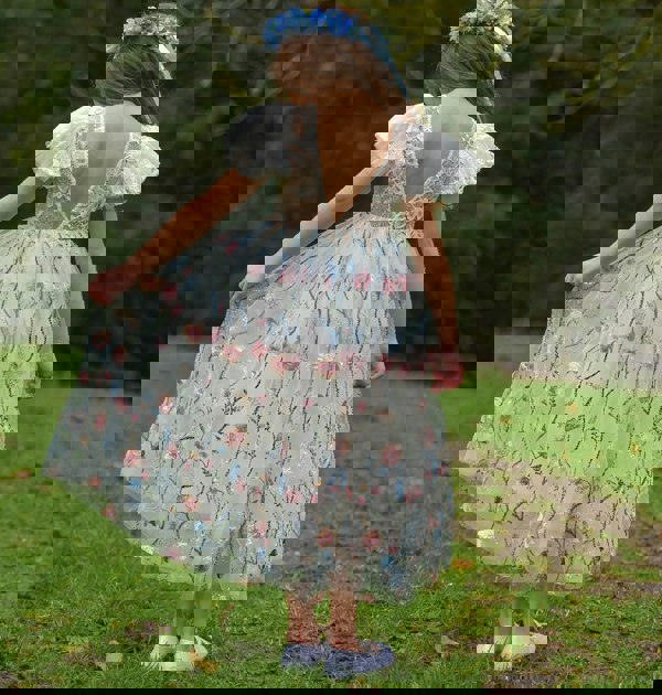 Rear detail on Freya Bella dress worn by model
