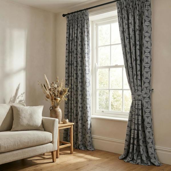 Axel made-to-measure curtains in Mono, styled in a living room