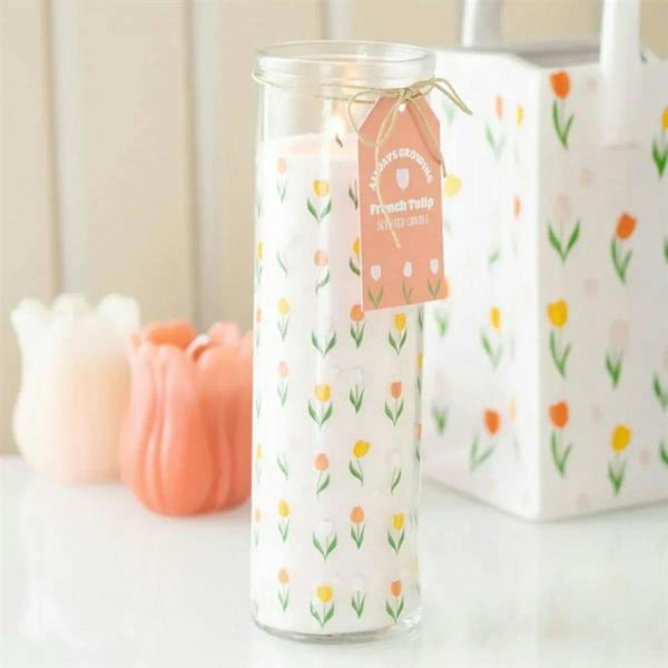 Glass tube candle with pastel tulip print and tied paper tag
