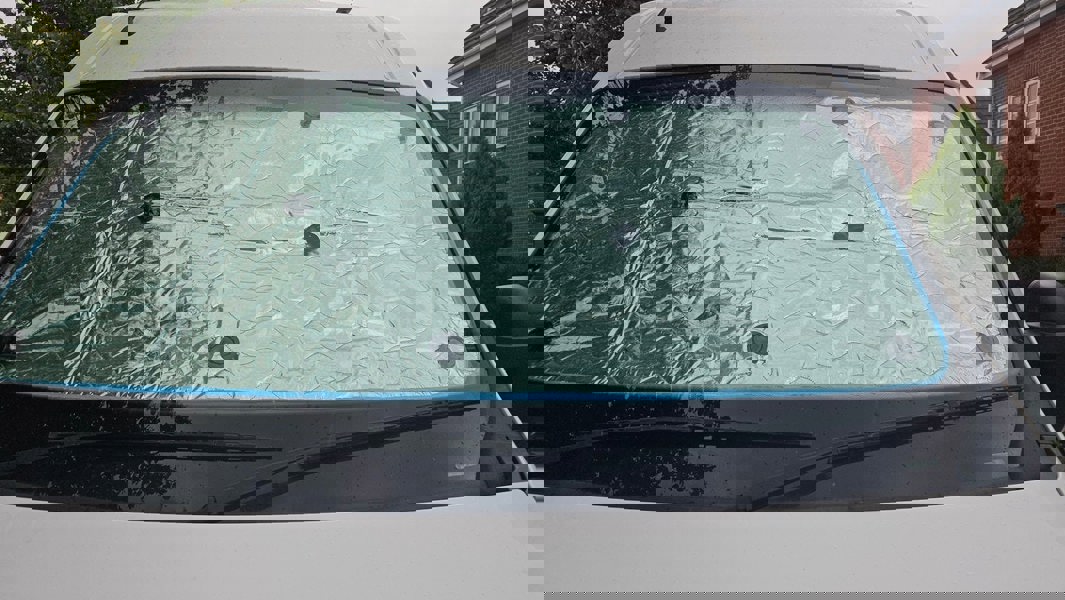 Internal Thermal Blind Set (Renault Master, Vauxhall Movano, Nissan Interstar/NV400) Pictured on the inside windscreen taken from outside the front of the van.