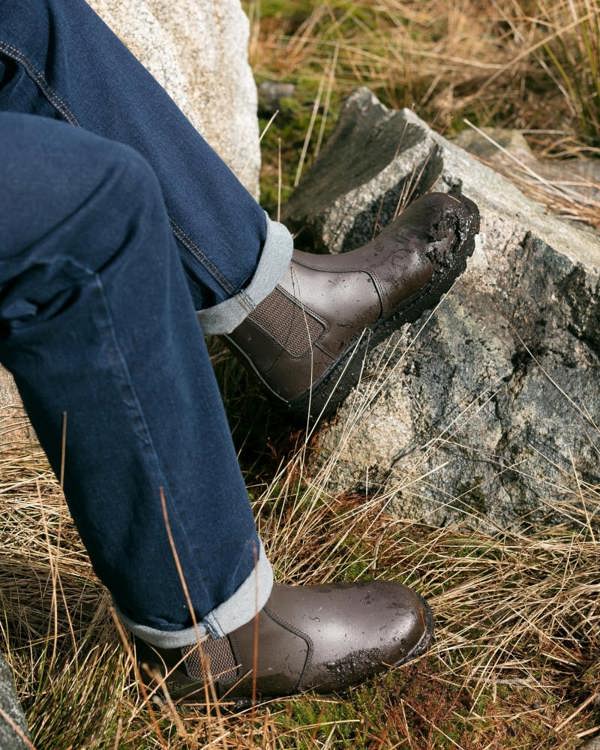 Farmer wearing the Hoggs of Fife classic dealer safety boots on the farm for protection and comfort