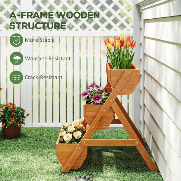 Brown A-frame 3-tier wooden planter box with potted flowers beside a wall