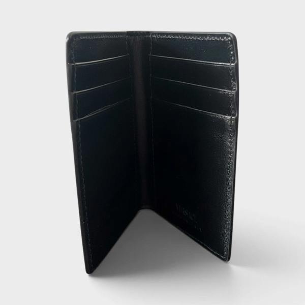 Supplied Fashion black leather card case with multiple slots and a minimalist structured design.